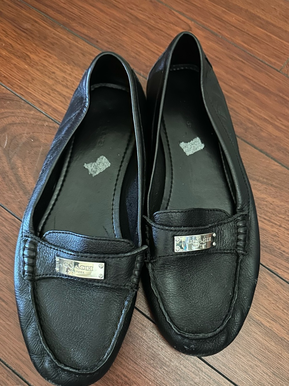 Coach Black Leather Women's Loafers with Metal Plaque